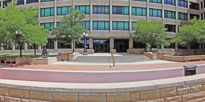 A panoramic view of a state or federal court building.