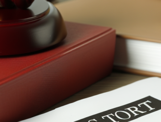 Close-up of legal documents and law books used by mass tort attorneys