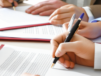 People signing papers to join a lawsuit